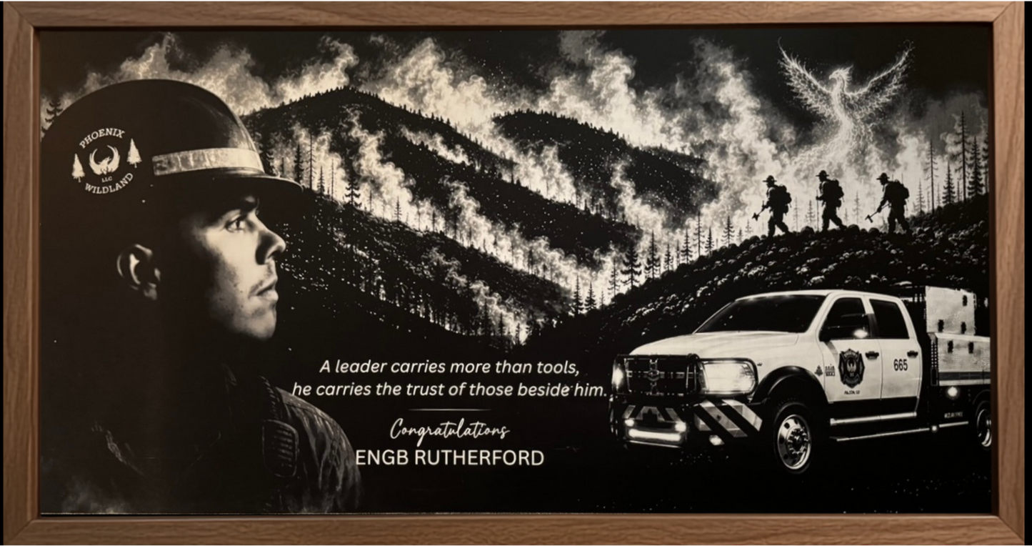 A framed black and white memorial print featuring a firefighter in profile, a wildfire scene with smoke and trees, a rescue truck, and the text 'Congratulations ENGB RUTHERFORD'.